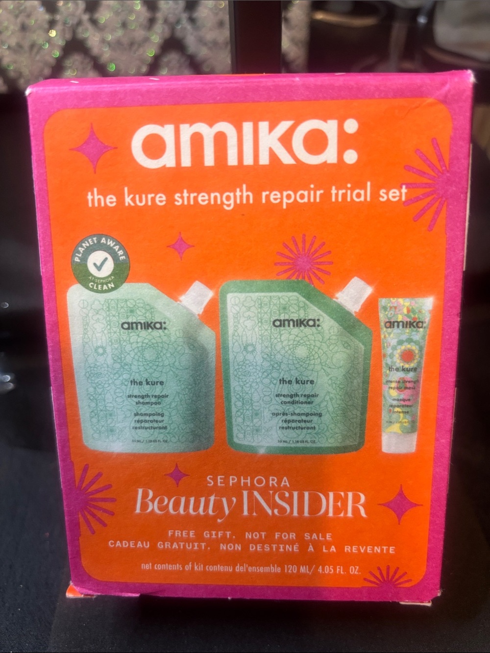 amika Trial Strength Repair Set in Pink and Orange Packaging